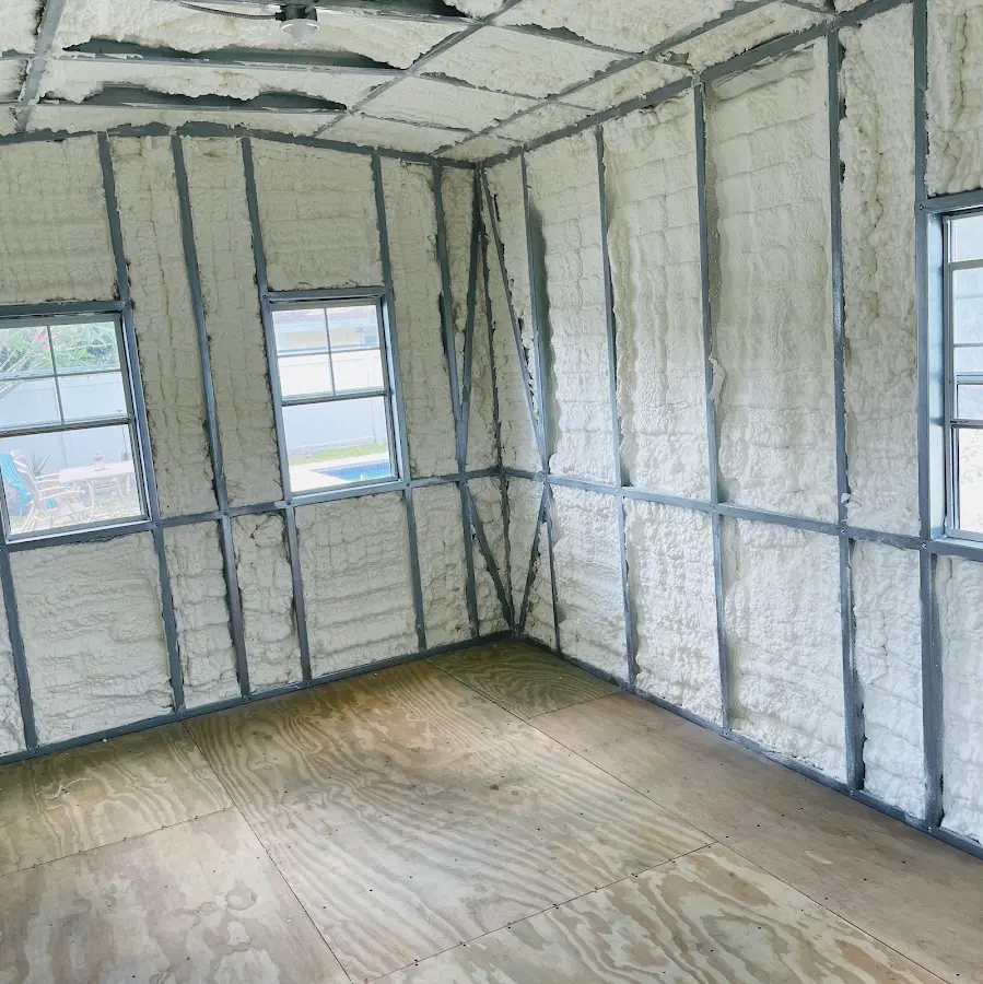 Closed-cell spray foam insulation applied to wall cavities in a residential project in Olney